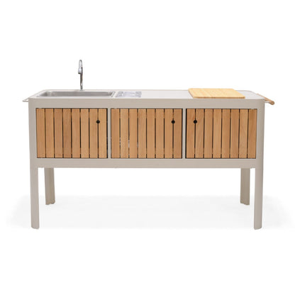 Portable outdoor kitchen with stainless steel sink and teak cabinet details.