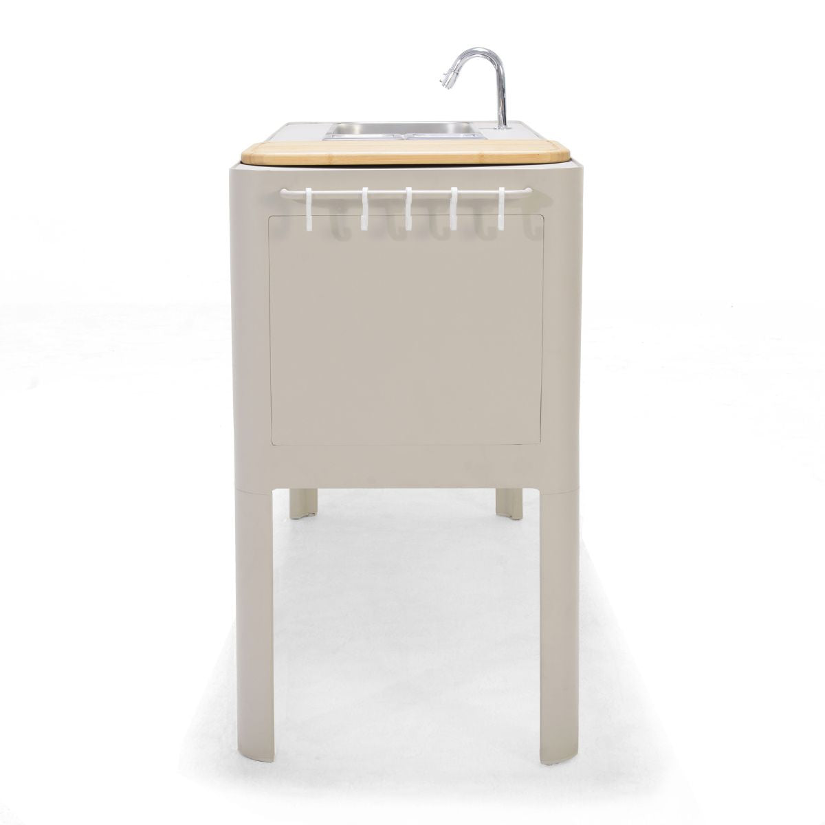 End view of the portable outdoor kitchen with the stainless steel sink and cutting board.
