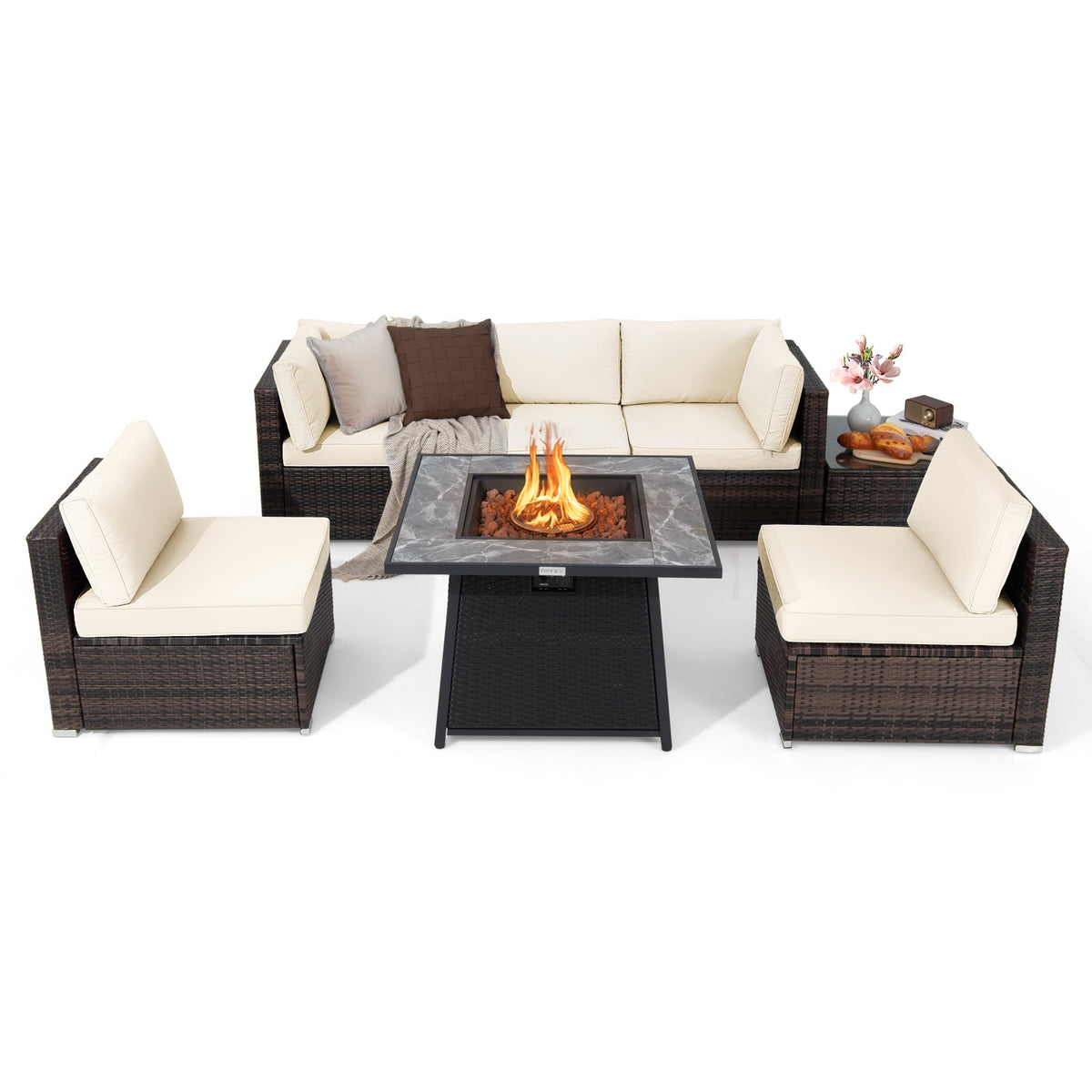 Seven-piece patio set in dark brown wicker with white cushions and a fire pit table.