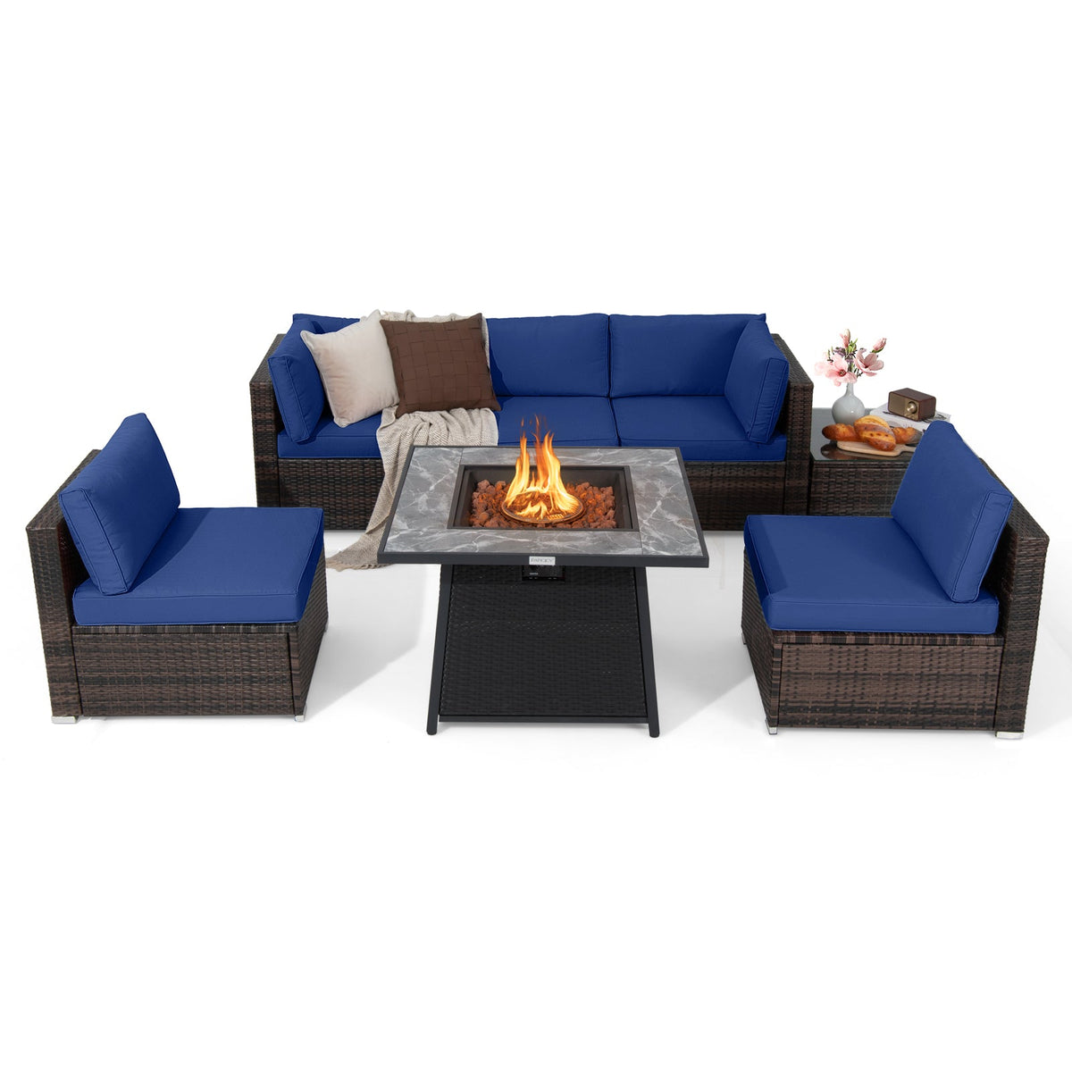 Seven-piece patio set in dark brown wicker with navy cushions and a fire pit table.
