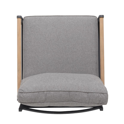 Outdoor lounge chair showing the cushioned seat, back, and FSC teak armrests.
