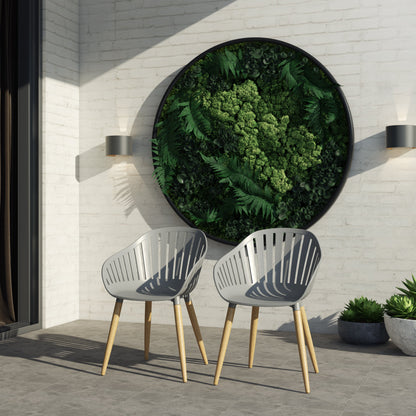 Nassau grey armchair with a wood frame and resin seat.