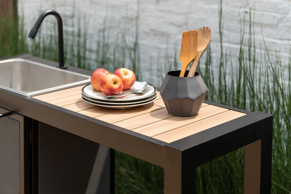 Angled studio view of the aluminium outdoor kitchen station with stainless steel sink.