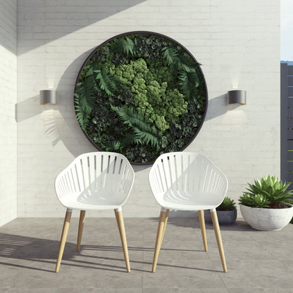 Two white resin armchairs with eucalyptus wood legs.