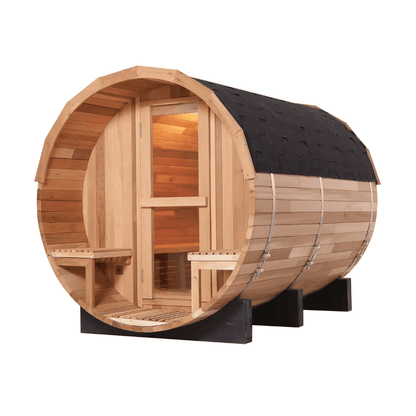 Red cedar barrel sauna with arched roof and glass door shown from an angled exterior view on a white background.
